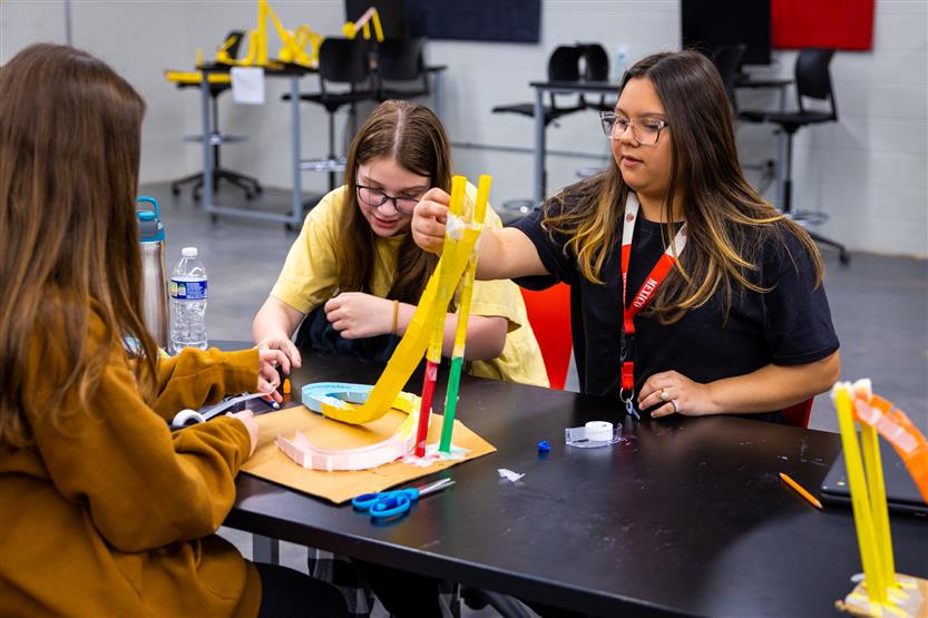 Students build paper rollercoasters